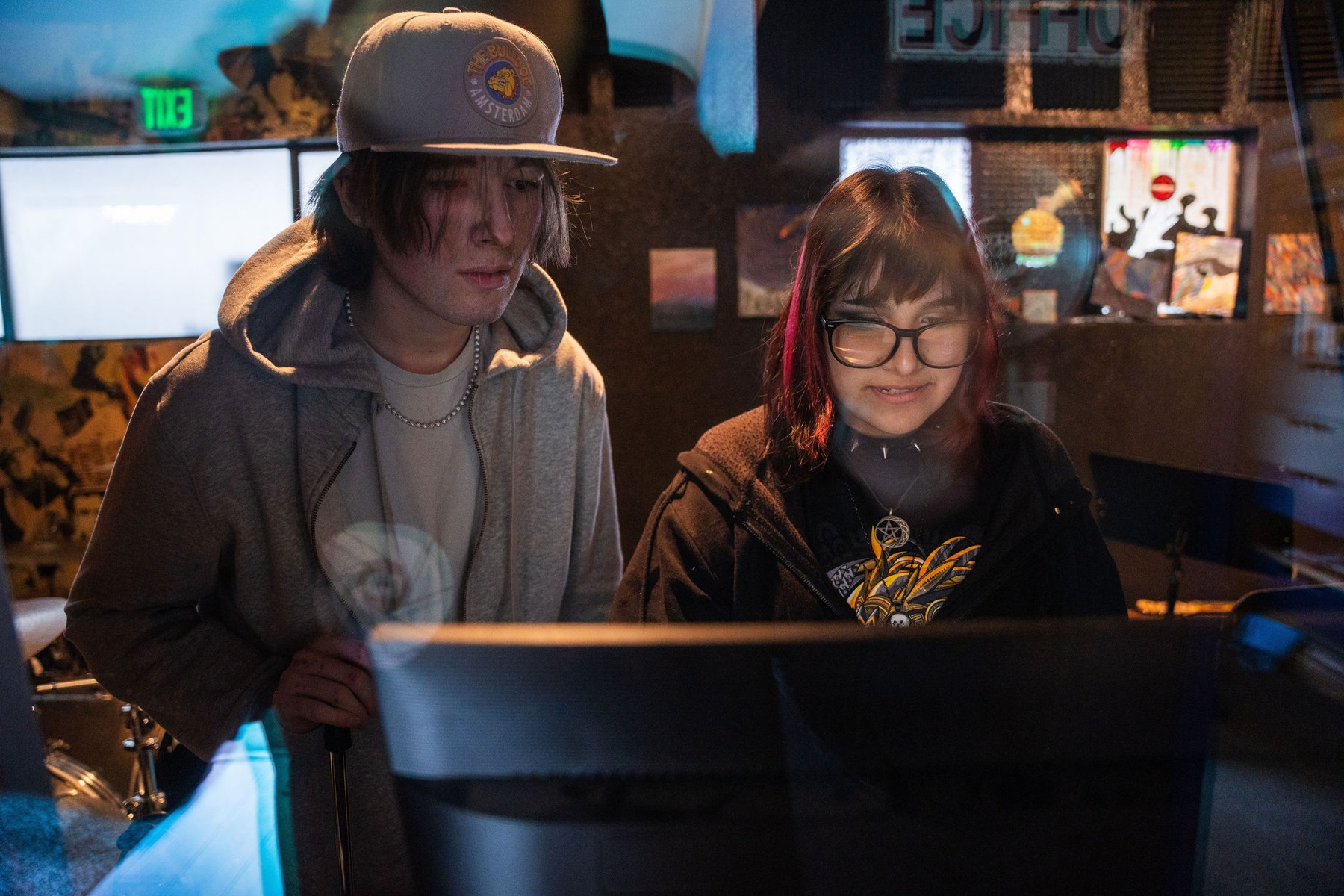 Two students working at a recording-studio computer